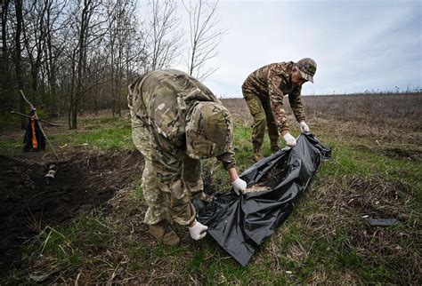Images appear to show Russian soldiers beheading Ukrainian .